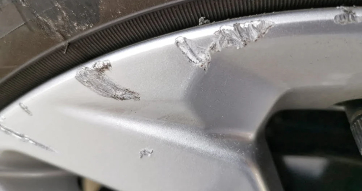 curb_rash_before curb rash before Rim Repair San Diego